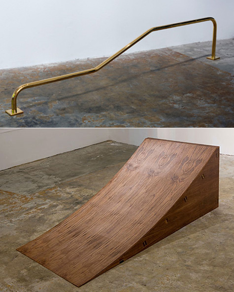 Gold skate rail and walnut skate ramp